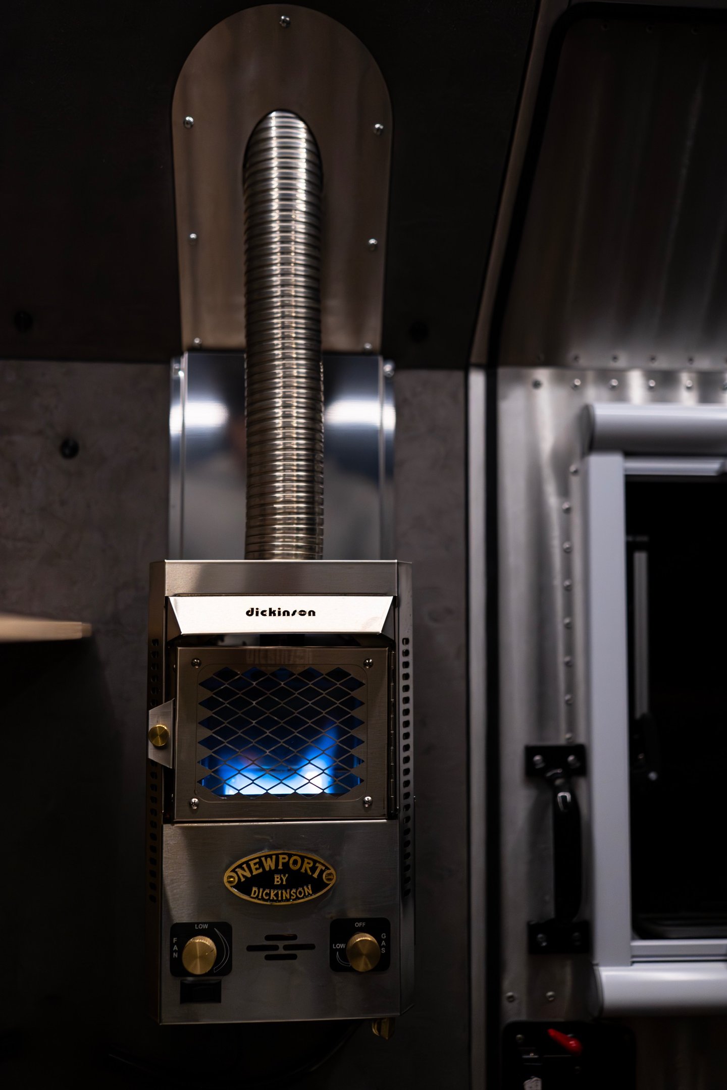 Dickinson propane heater mounted inside a Kimbo Camper.