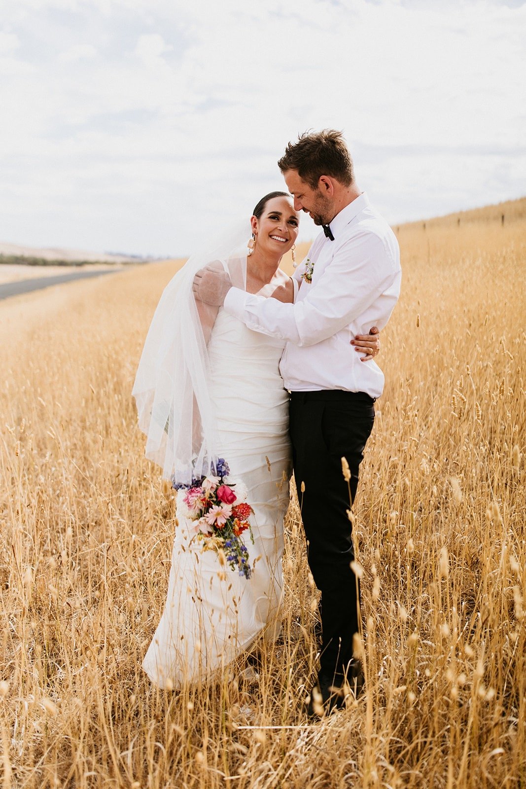 Happy couple walking down the aisle after saying I do on the Sunshine Coast and Noosa Wedding