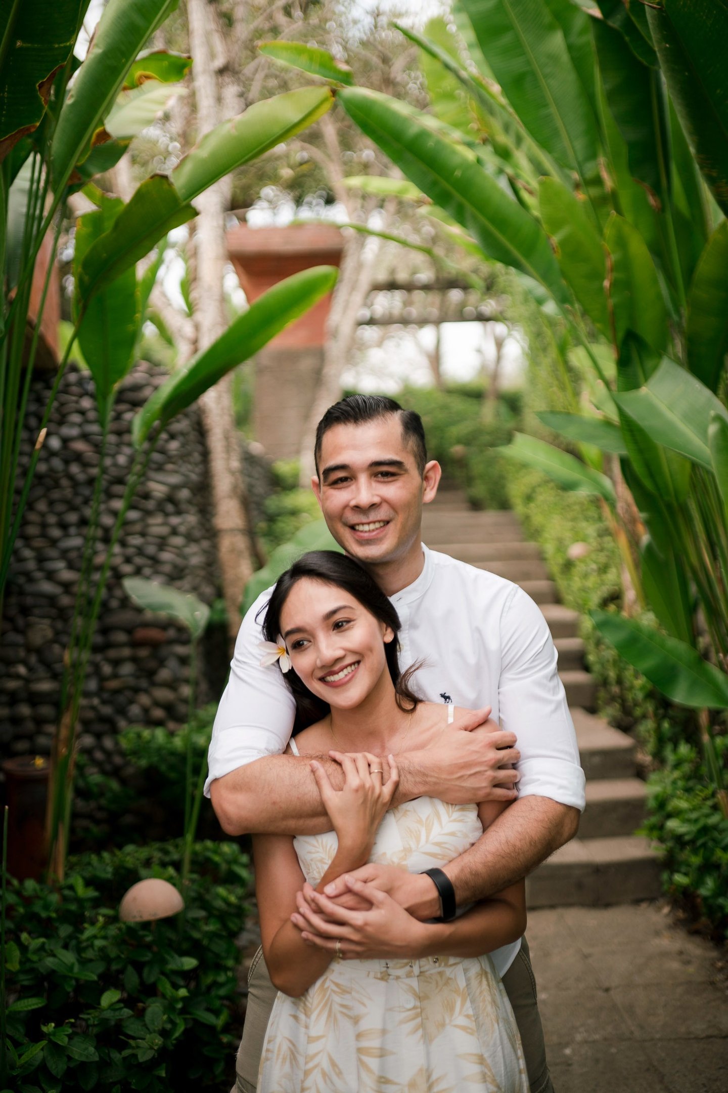 Close portrait of romantic couple surrounded by tropical greenery at Waka Gangga West Bali