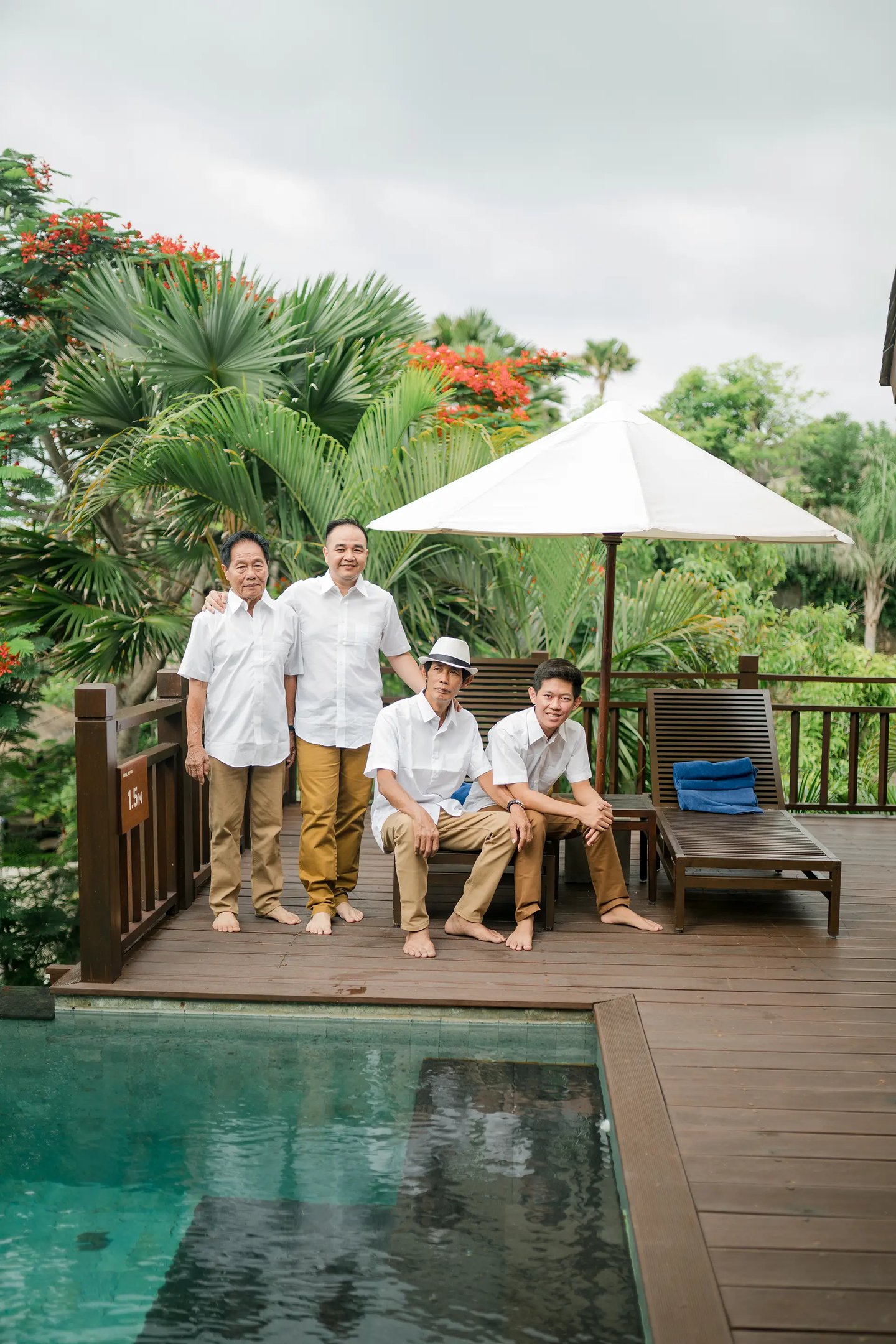 Selly family enjoying a poolside moment at Karma Kandara Uluwatu Bali  