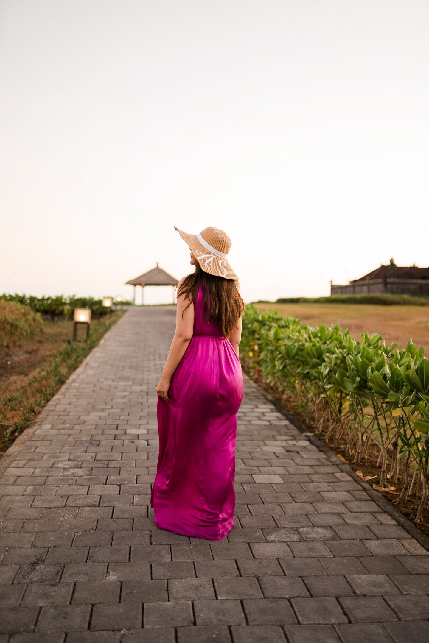 Luxury portrait session along resort pathway at Alila Soori Tabanan Bali