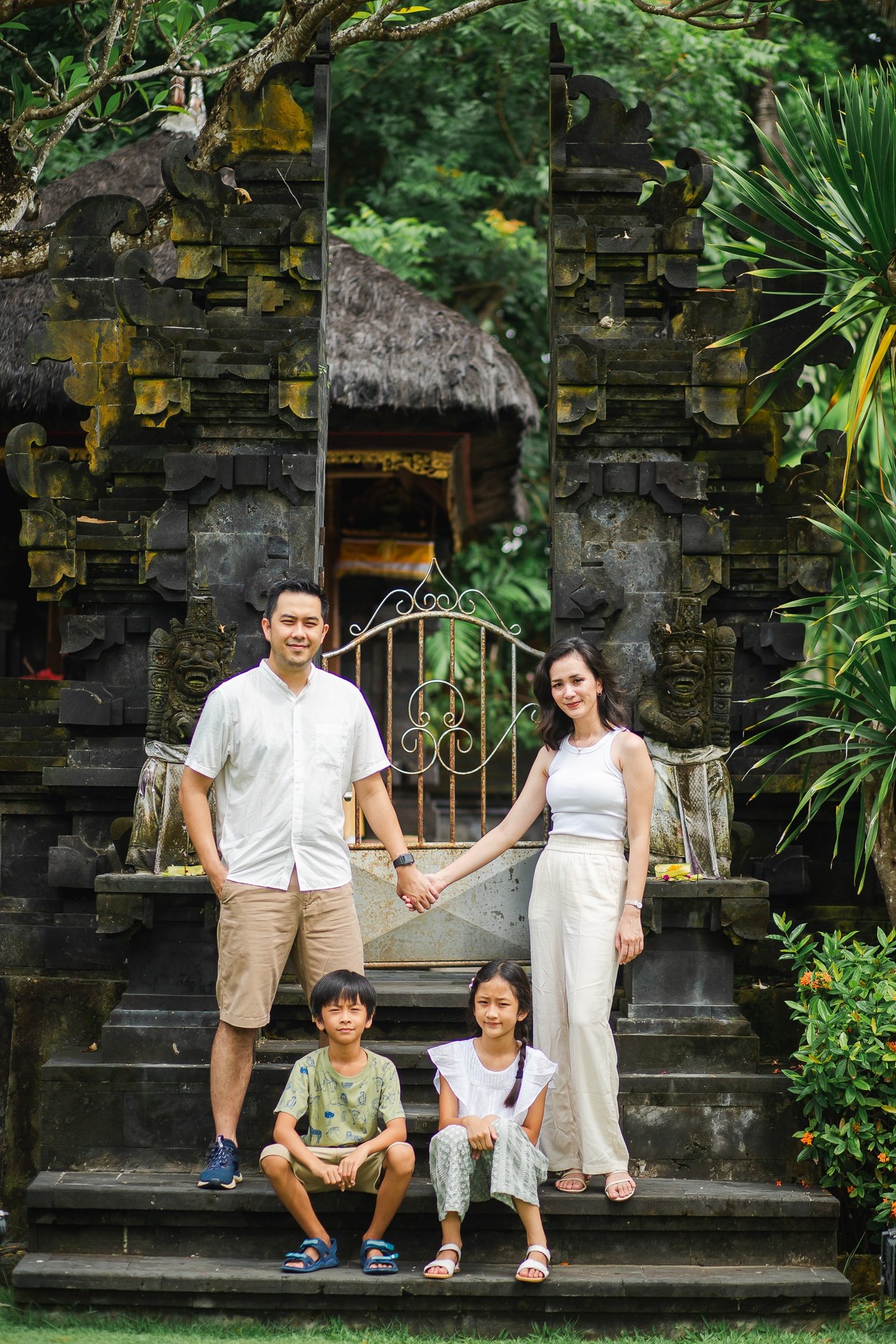 family photography session at Westin Nusa Dua Bali resort entrance with tropical architecture