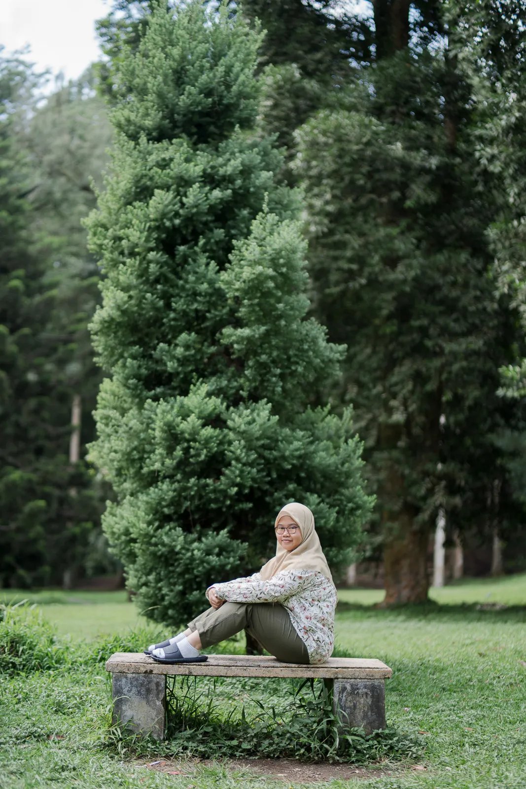 Sister portrait captured in the peaceful greenery of Botanical Garden Bedugul Bali.