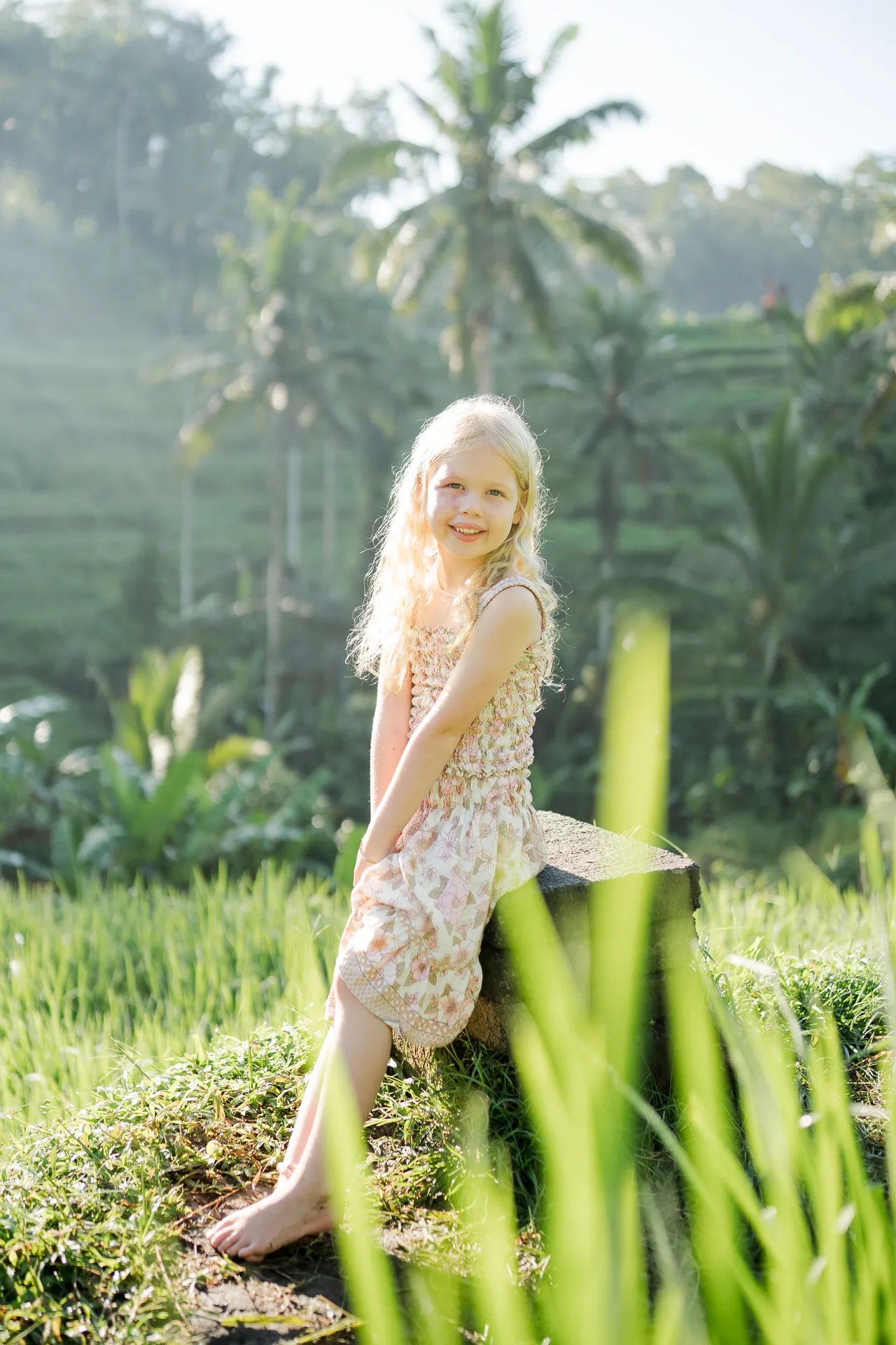 Child portrait in the rice fields during a scenic family photography session in Tegalalang Bali