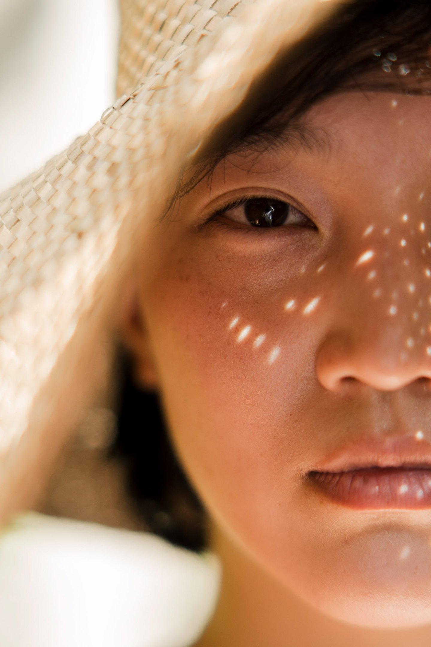 Close-up portrait with natural sunlight at Bvlgari Uluwatu Bali, refined lifestyle photography session