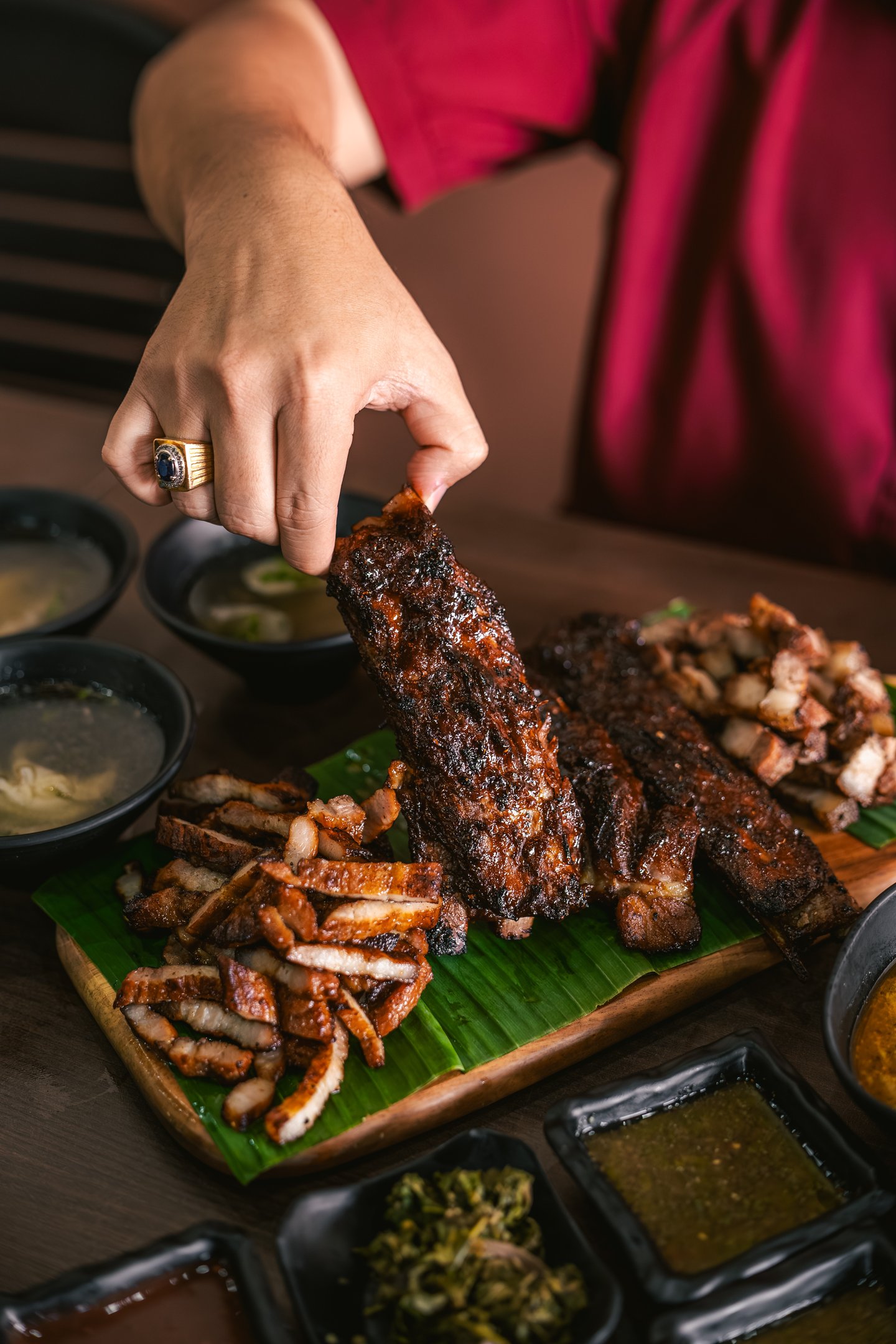 a platter of meat and Iga Bakar at BPK Chika Batam