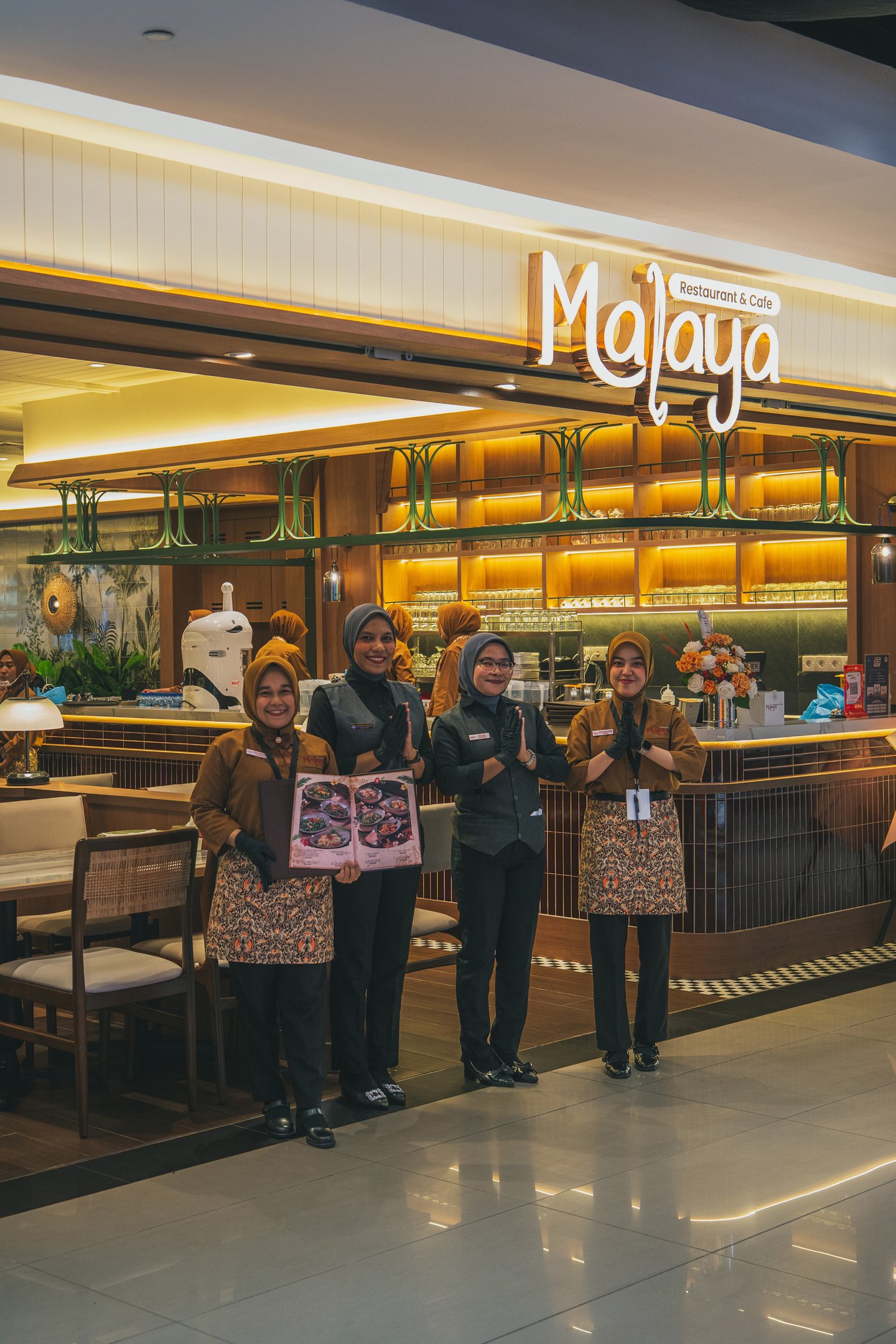 staff welcoming at Malaya cafe Batam