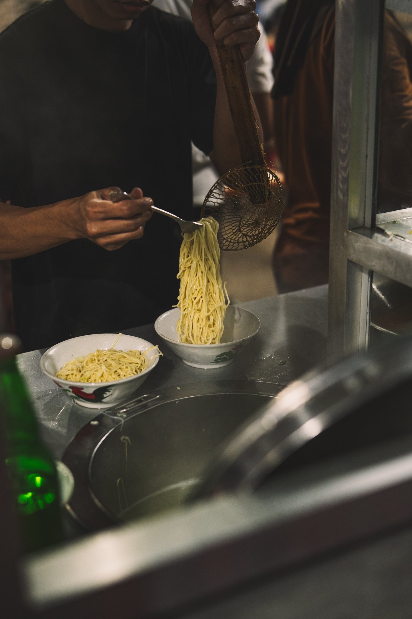 Chef preparing mie ayam at Langgeng Mie Ayam Bakso Batam