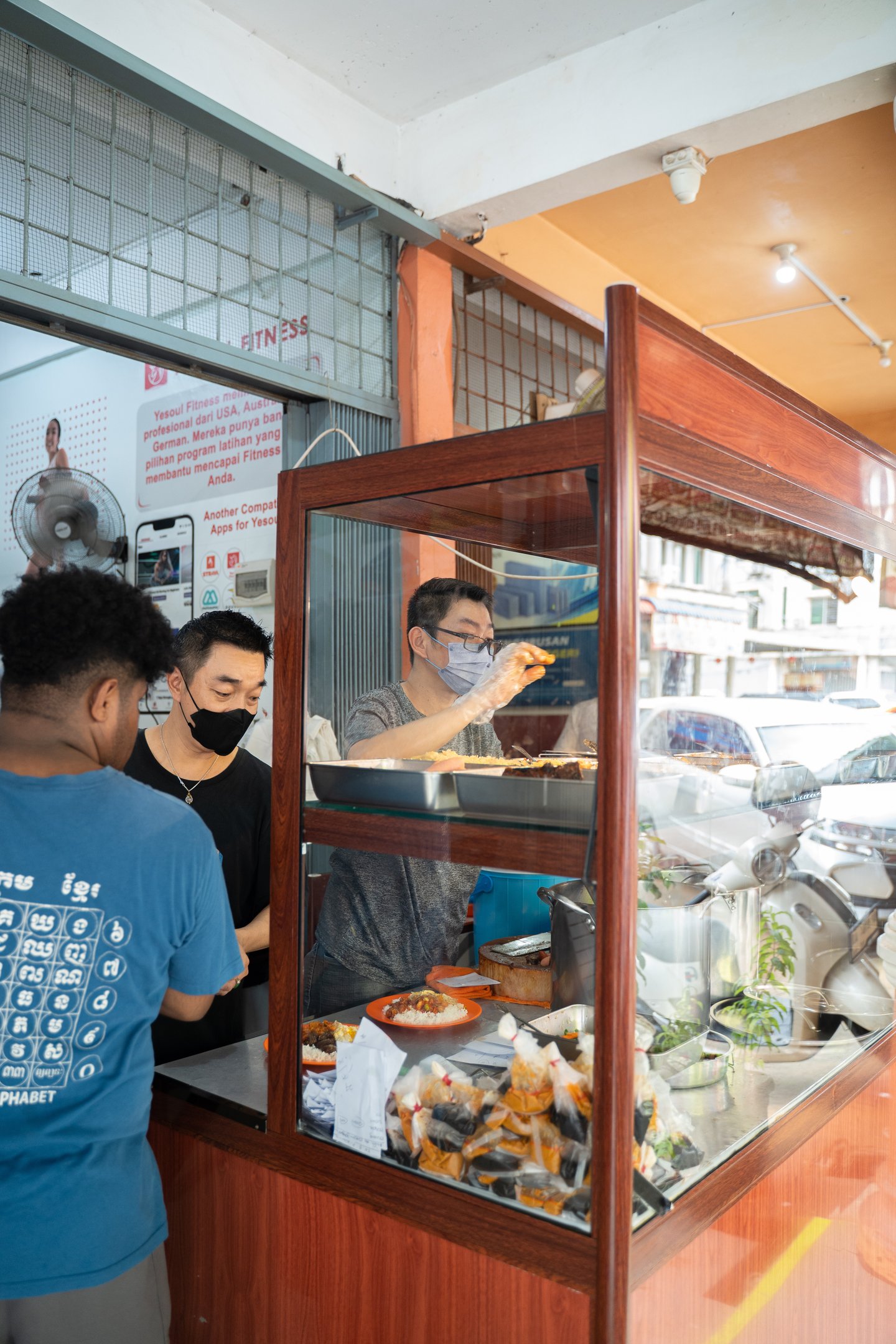 People preparing Non-Halal Nasi Kari at Nasi Kari Ali Batam