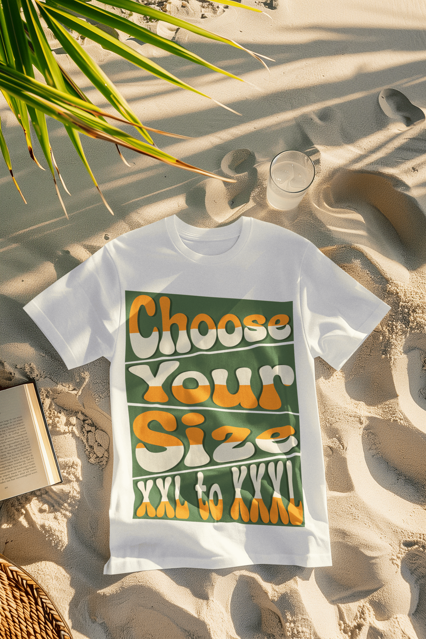 Plus size white graphic t-shirt on a tropical beach with a book and iced drink.