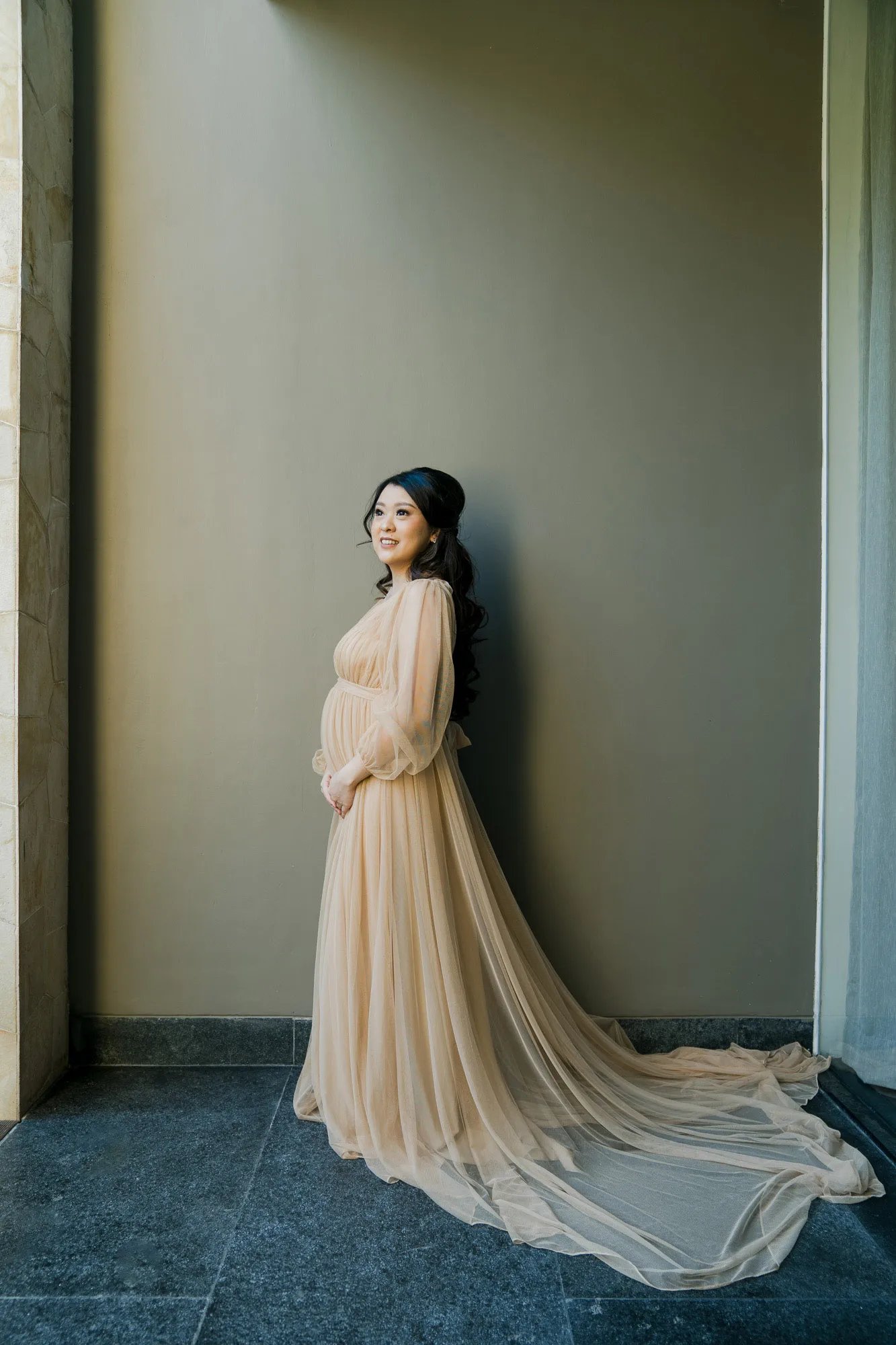 Luxury maternity portrait inside The Apurva Kempinski Bali suite
