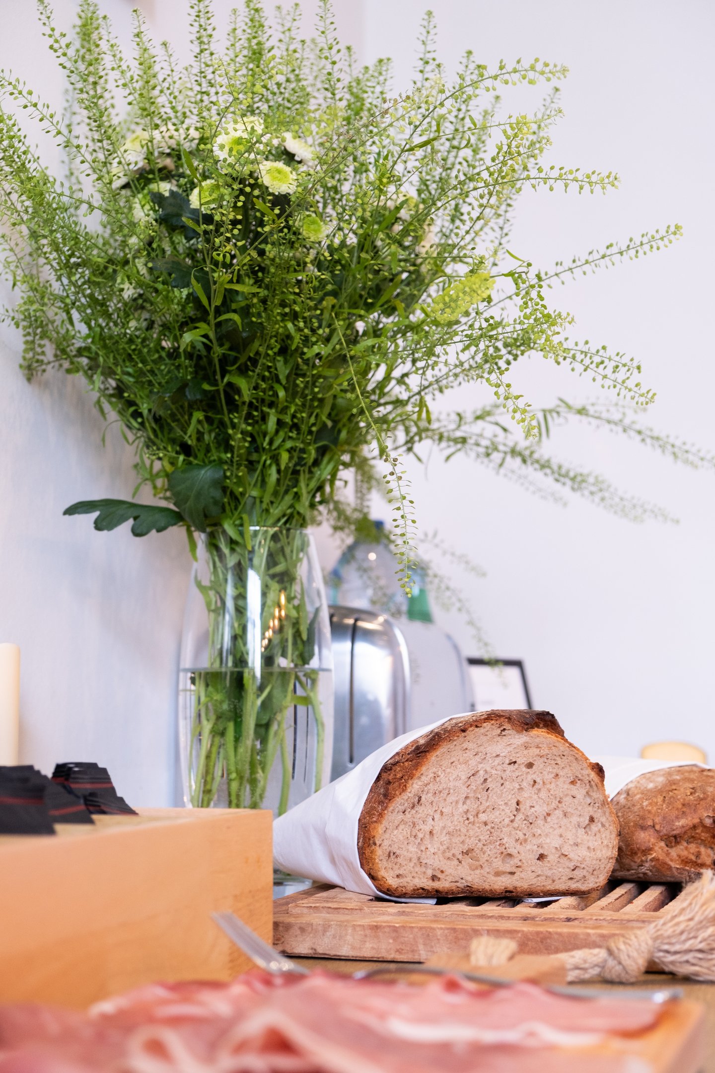 Fresh artisan bread and continental breakfast selection at The Hamptons Boutique Hotel in Ghent.