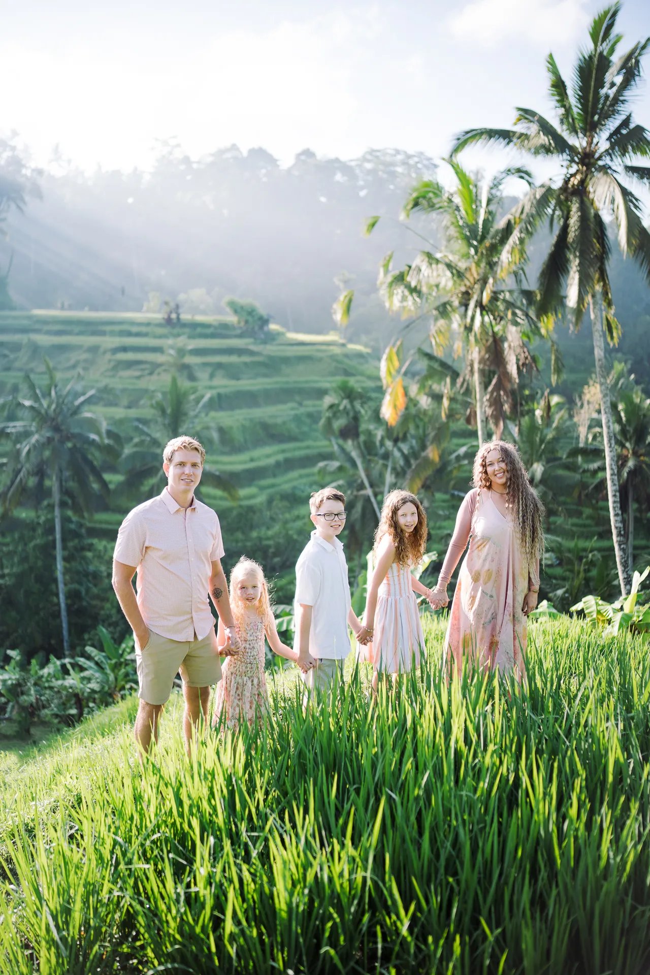 Scenic family photography session in the rice fields of Tegalalang Bali
