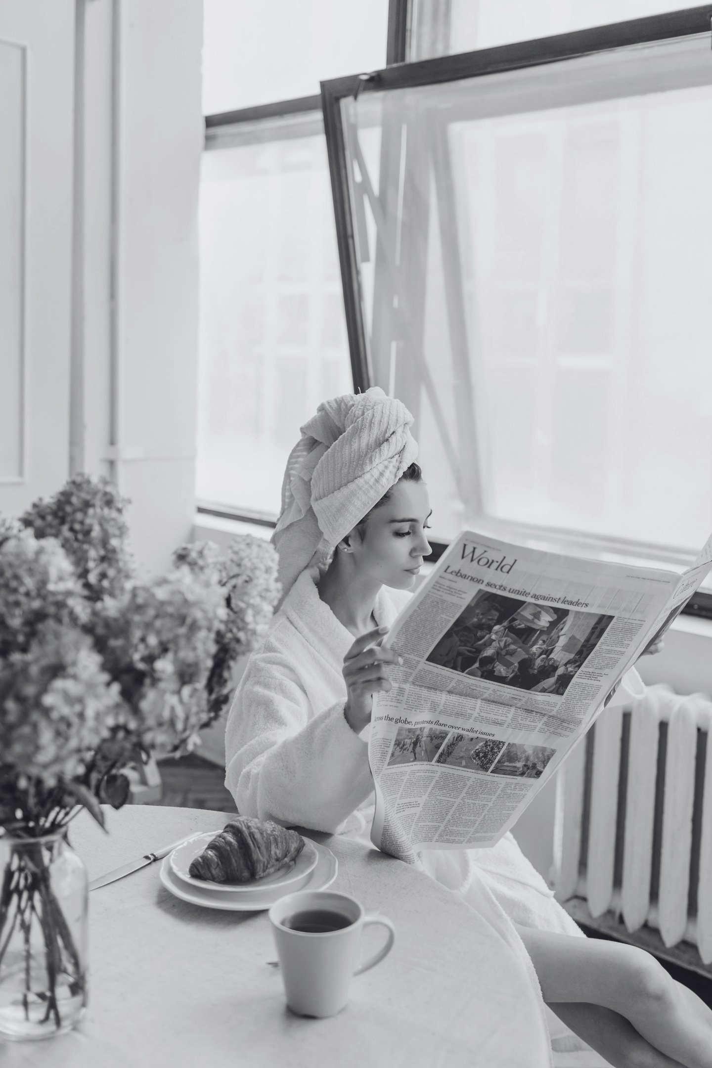 a woman reading the latest news about piano piano as she wanted to keep informed.