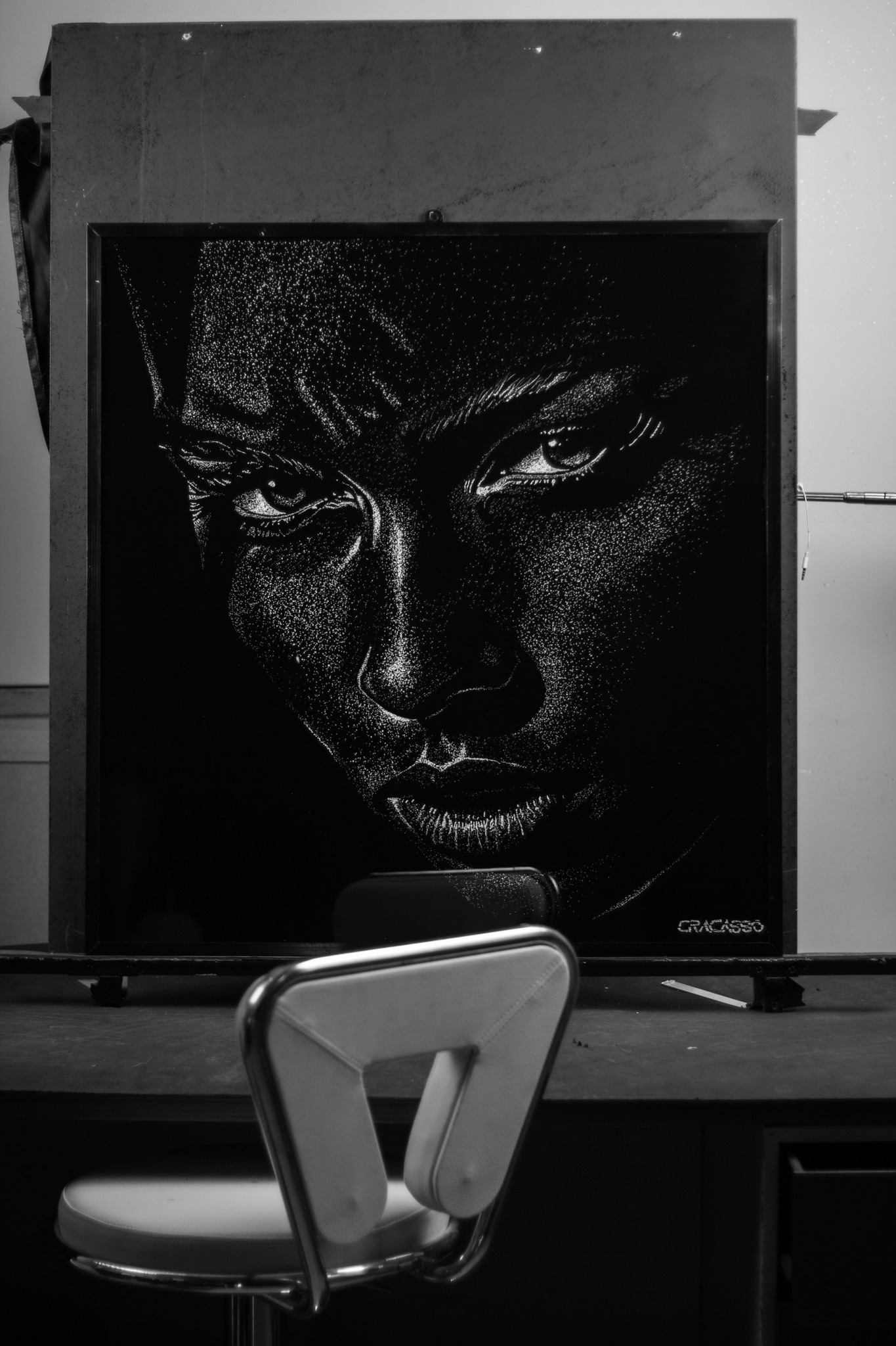 Intense Gaze one-of-one broken glass portrait on laminated glass