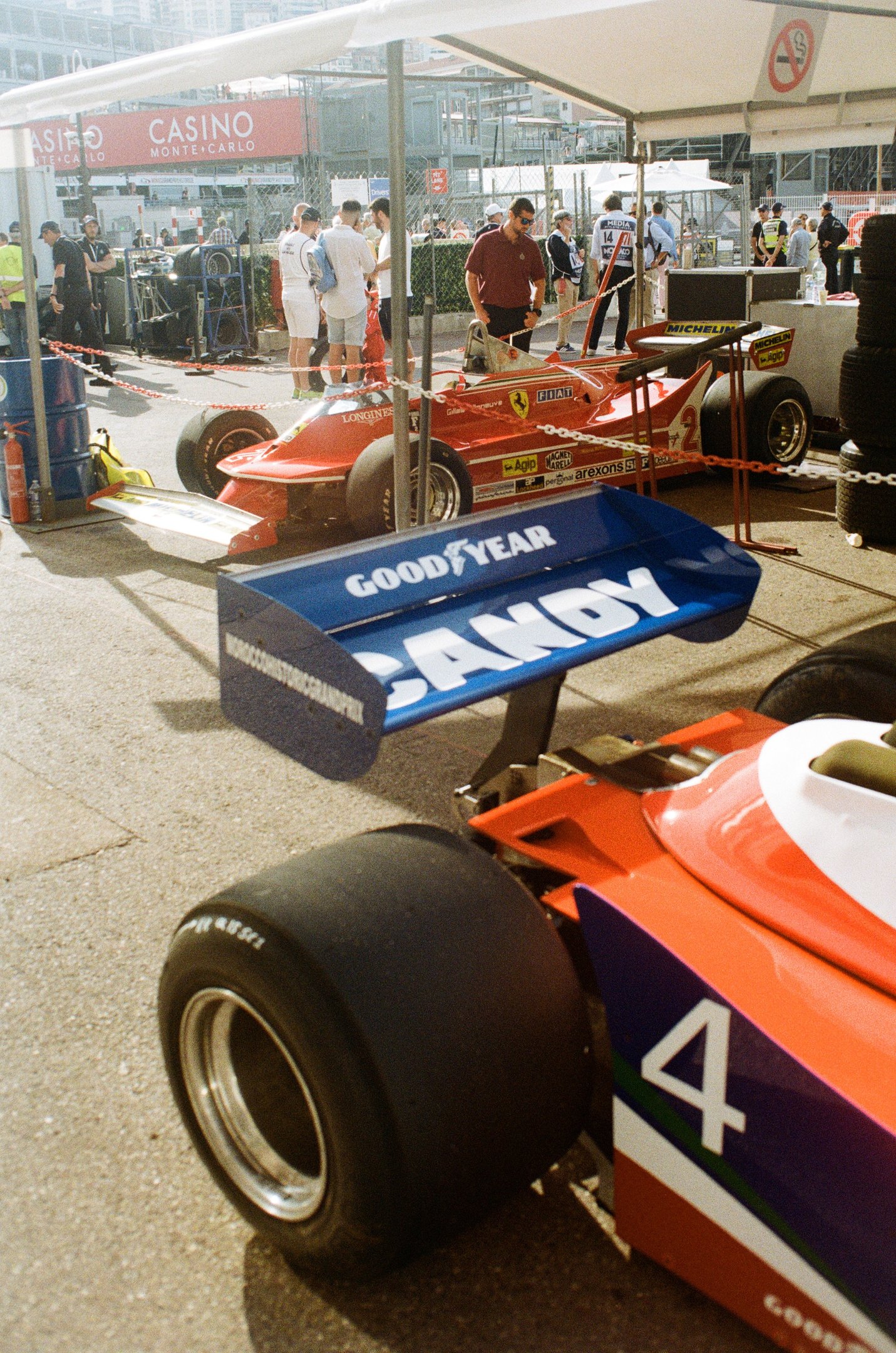 a race car parked in the paddock