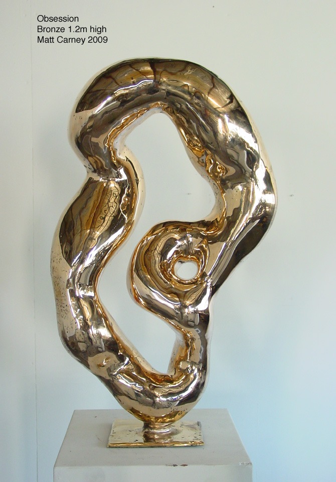 a highly polished reflective abstract bronze sculpture 