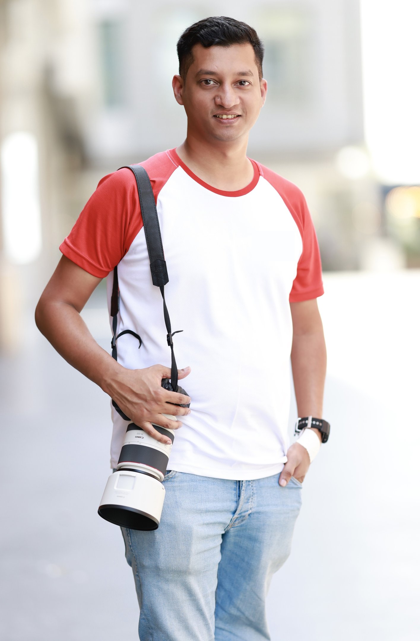 a man with a camera and a camera