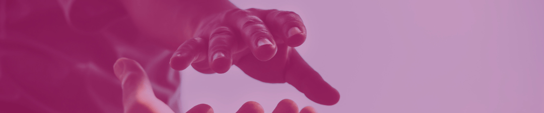 a person holding a microphone in their hands