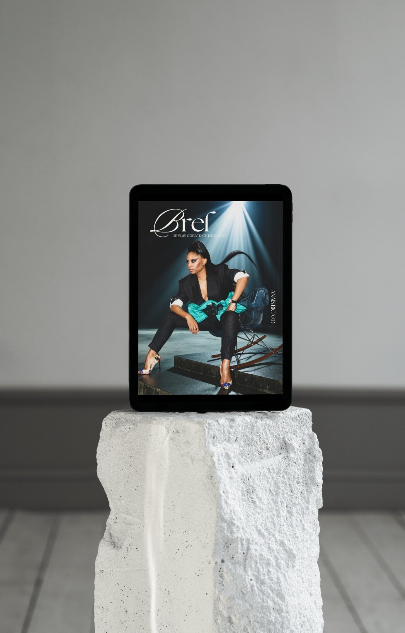 a tablet with a magazine cover of a woman