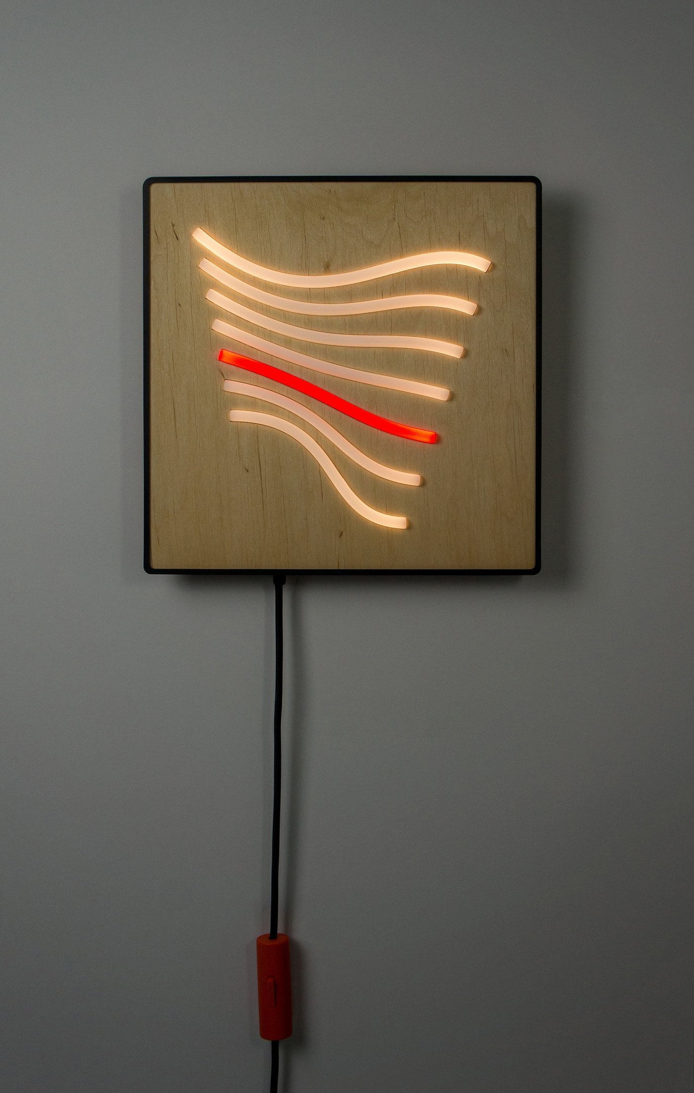 Grid 01 — square birch wall object with cast resin lines and red signature, edition of 25