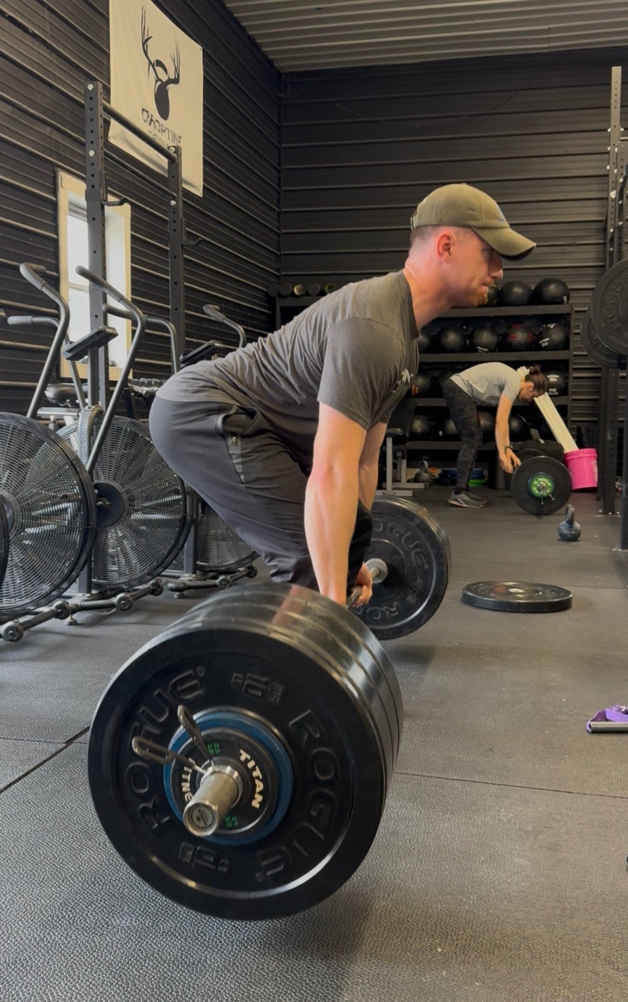 a man with a barbell