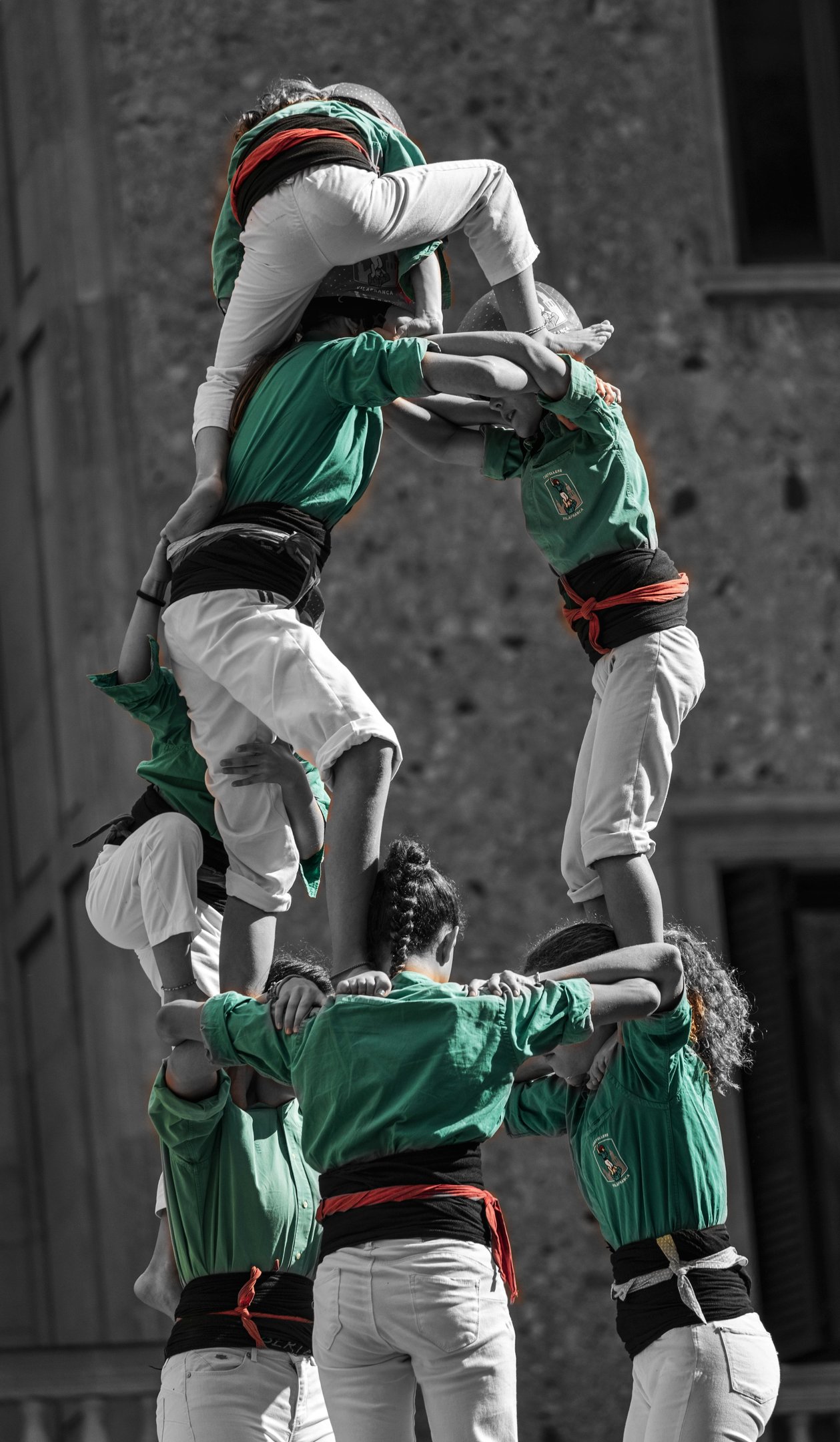 a group of people standing on top of a tower