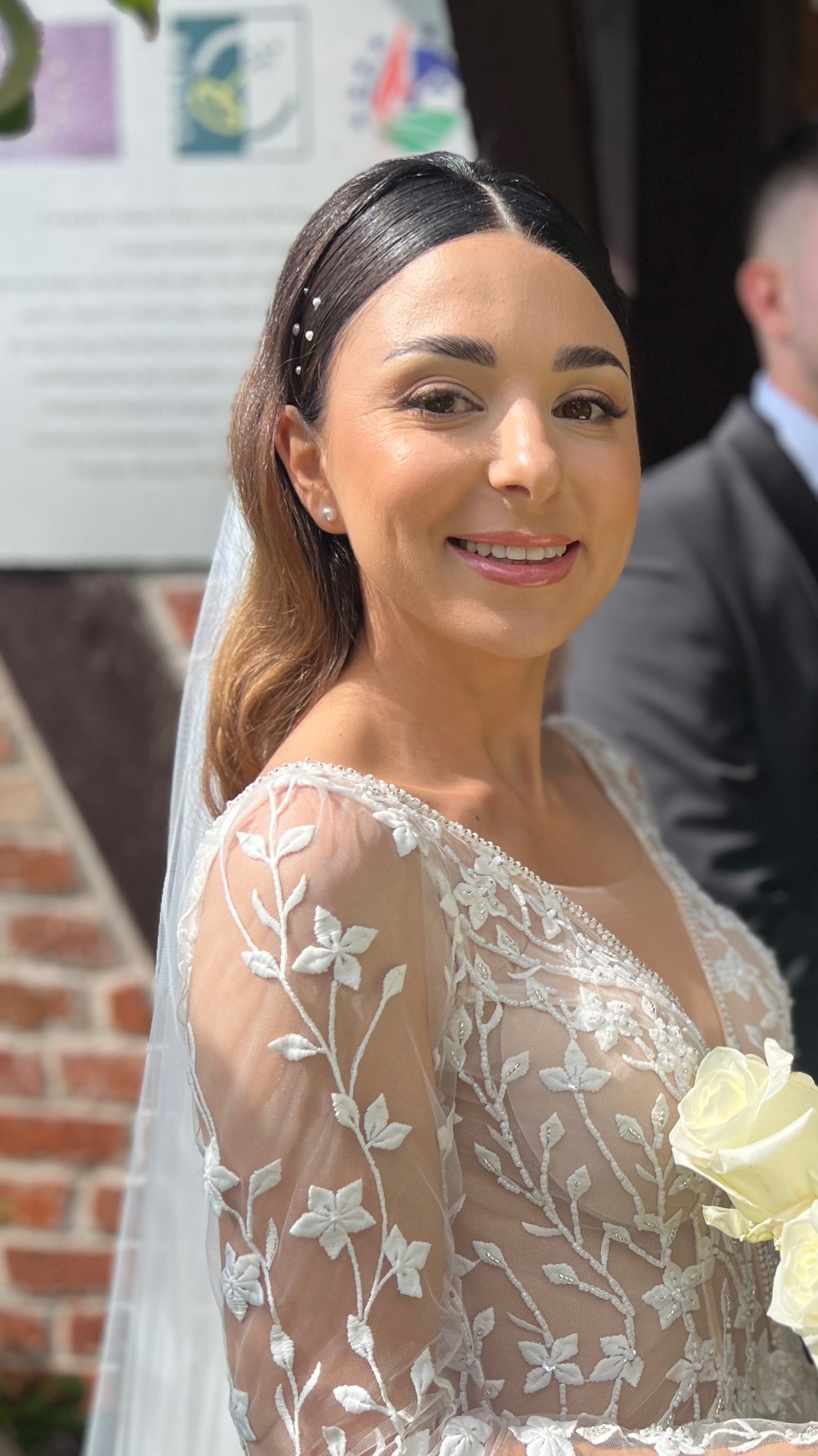 a woman in a wedding dress and a man in a suit