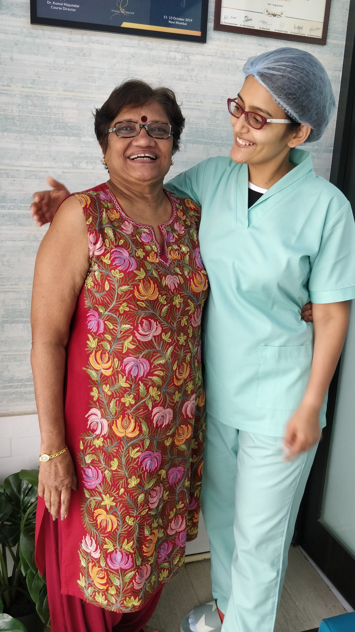 Happy dental patient after painless Dental Implants at top dental clinic near orlem malad west in mumbai