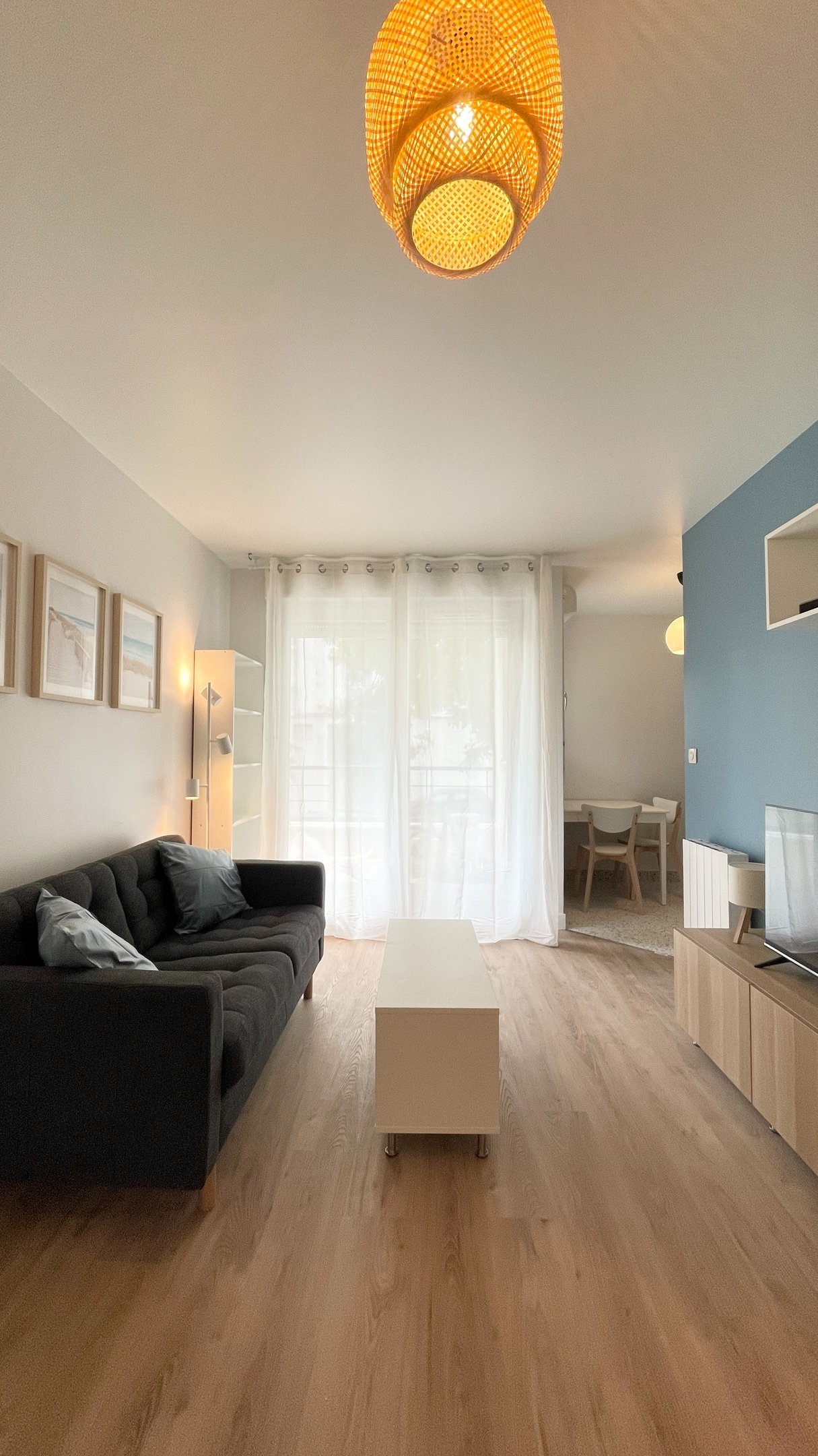 a living room with a couch and a television