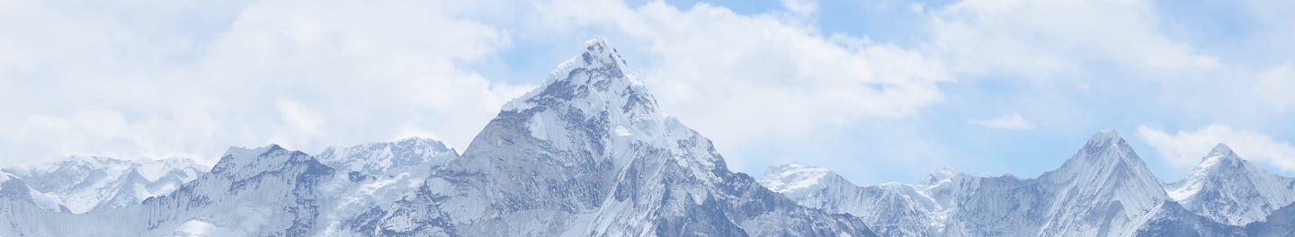 a mountain range with a few people on it