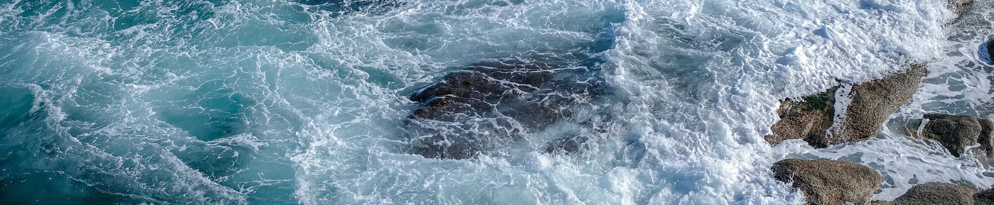 Waves crashing on rocks