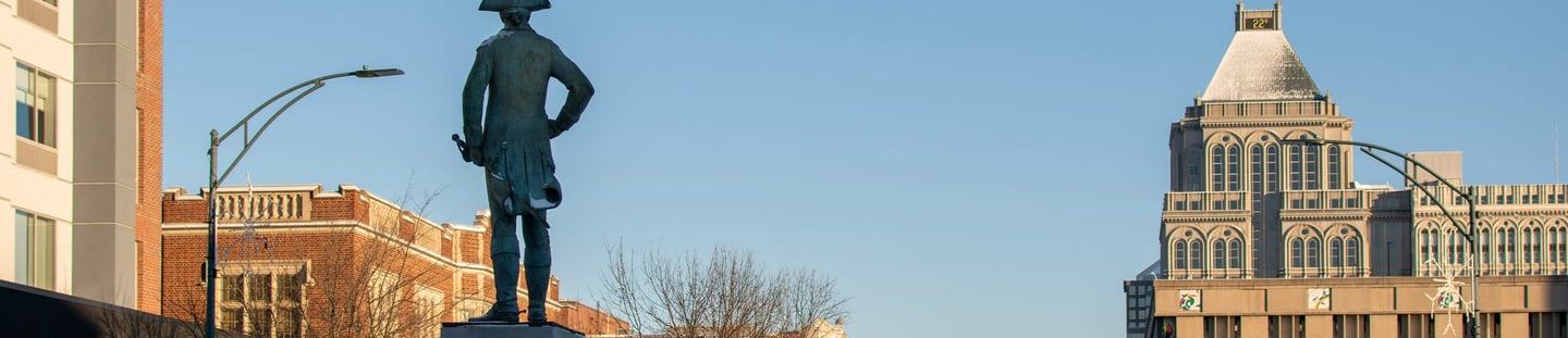 Shot of Downtown Greensboro and a statue of General Green