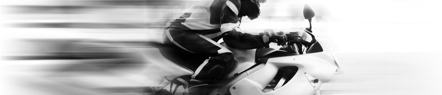 Blurred image of motorcycle to give illusion of speed