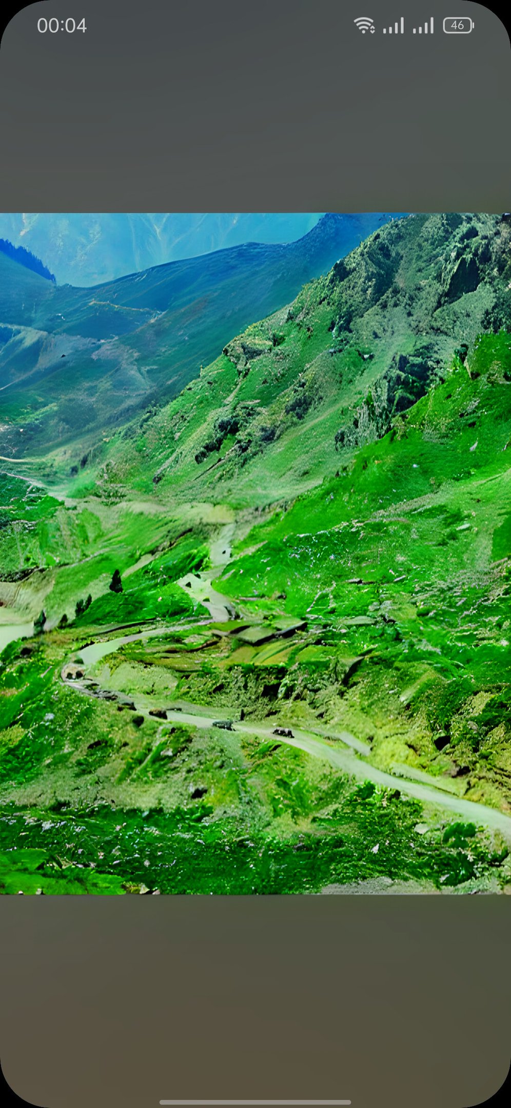mountainous jeep track towards saiful malook lake with a view of a valley 