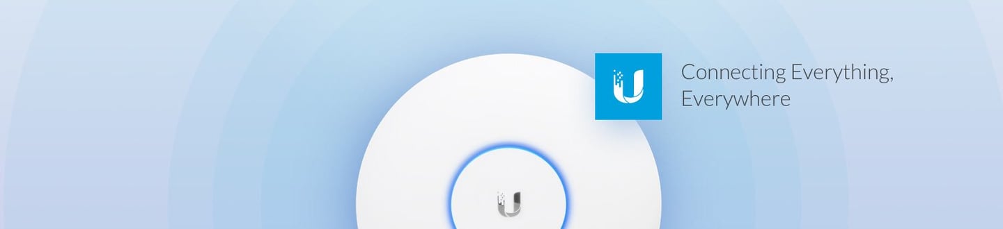 Ubiquiti UniFi wireless access point with blue LED ring on a light blue gradient background.