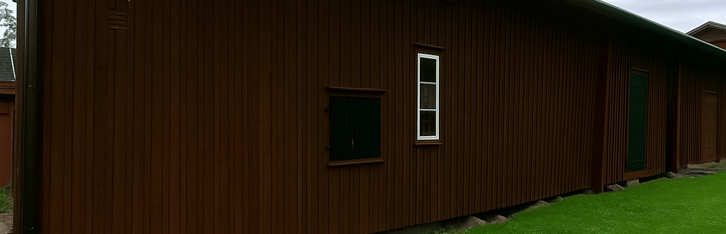 old wood barn painted with breathable paint