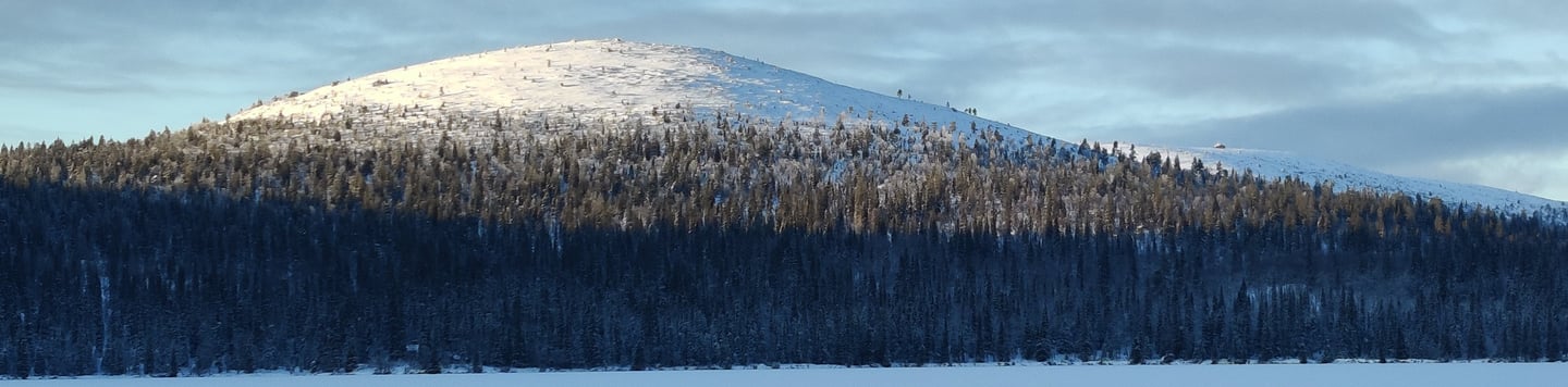 panoramic view of a snow covered fell in lapland, keimiö