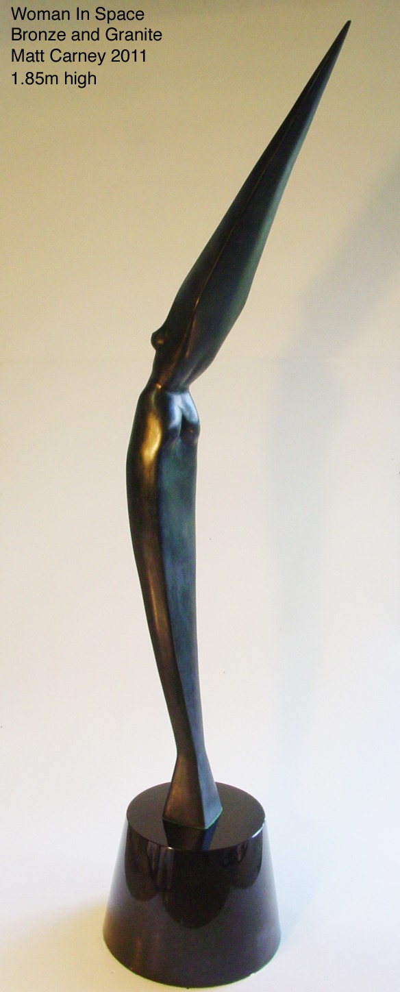 a sculpture of a woman's torso inside an elongated diamond shape on a black granite base (rear view)