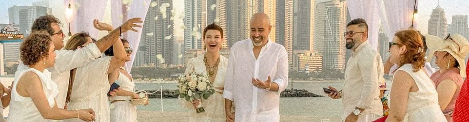 Candid wedding moment in Dubai Marina by leading UAE wedding photographer.