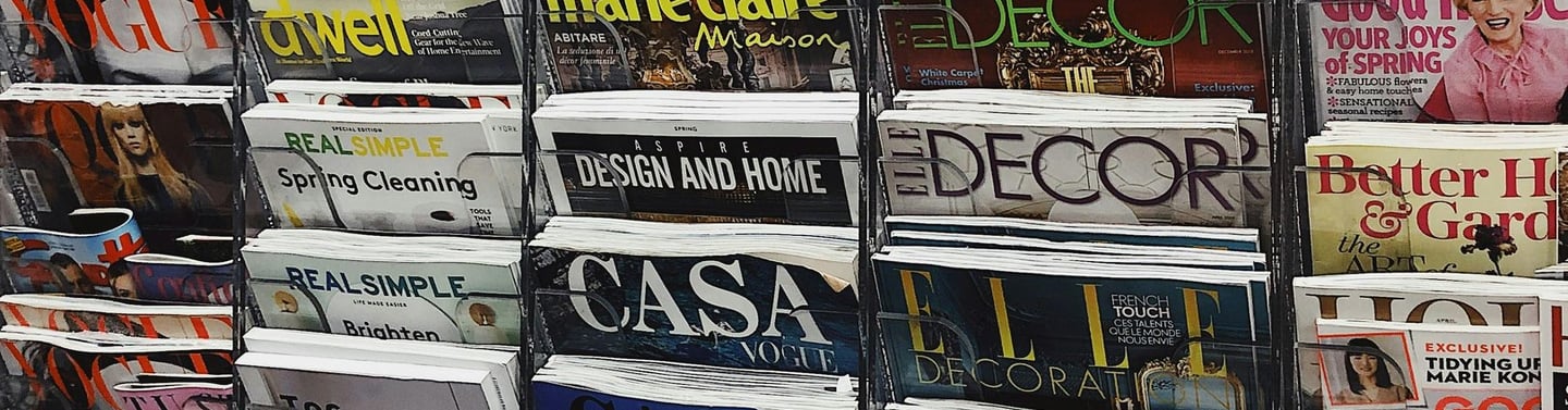Magazines on a rack. Written word careers in brief