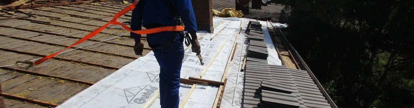 Staff safety harnessed to harness line, safety first, Hyde Park, Sandton