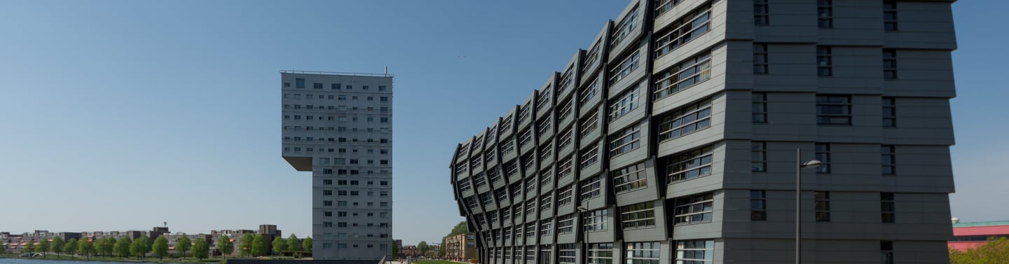 a building with a long walkway in Almere Stad