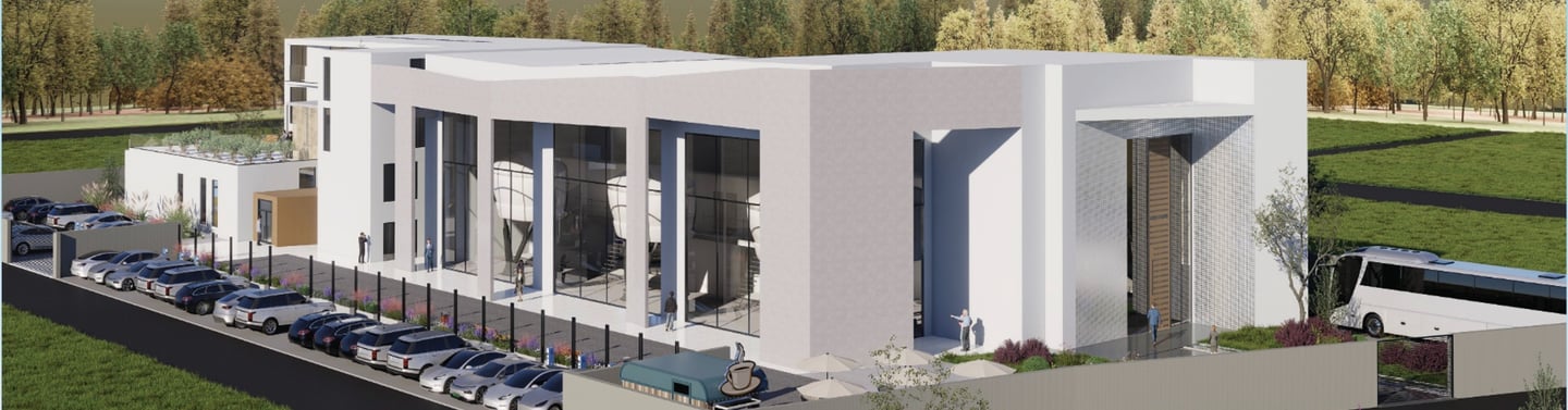 Modern white commercial building architectural rendering with glass facade and parking lot.