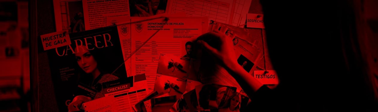 A silhouette of a detective pinning photos to a crime investigation board under intense red light.