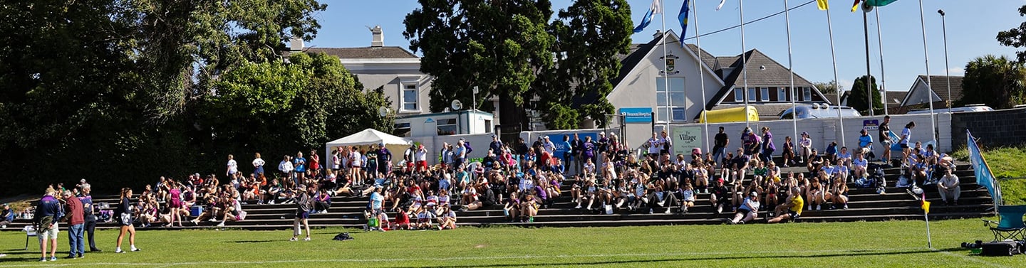 Spectators watching from the steps in Kilmacud Crokes Glenalbyn