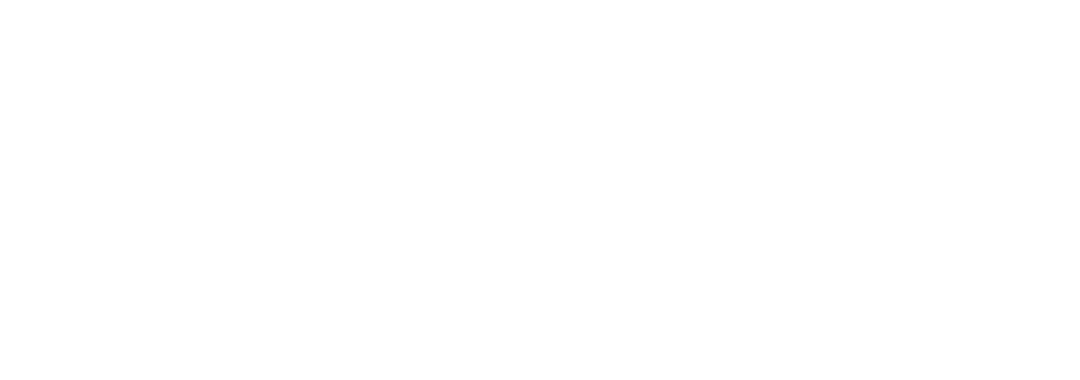 a man in a suit and tie is holding a camera