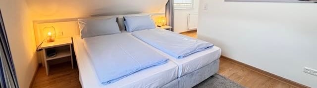 Hotel DunenNest - Kleines Suite, Schlafzimmer, Boxspringbett