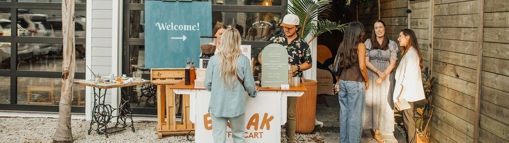 Guests enjoying break coffee cart in front of Jenna Alexanders studio