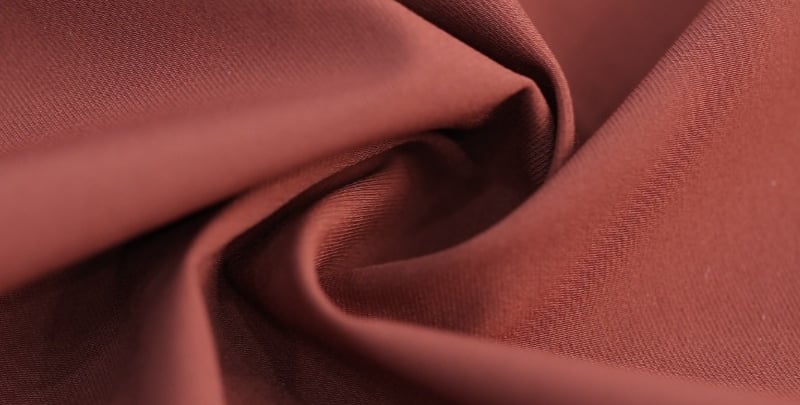 Red woven fabric with smooth texture